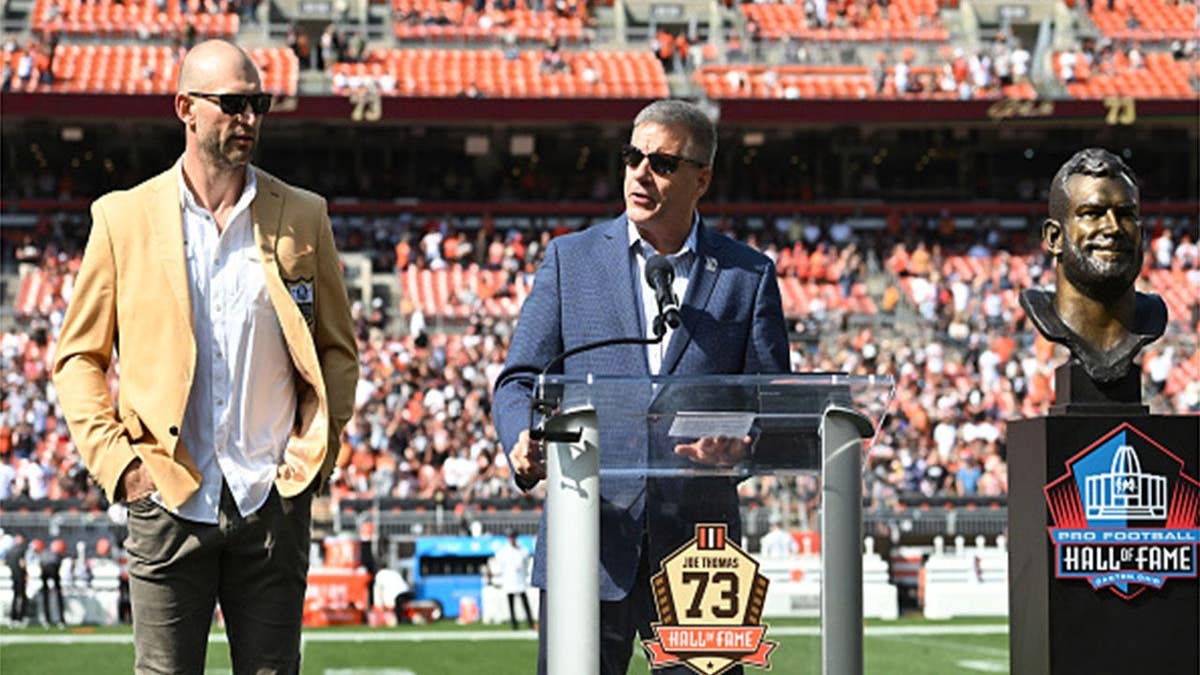 Joe Thomas watches NFL Hall of Fame President Jim Porter speak during a Browns Ring of Honor ceremony.