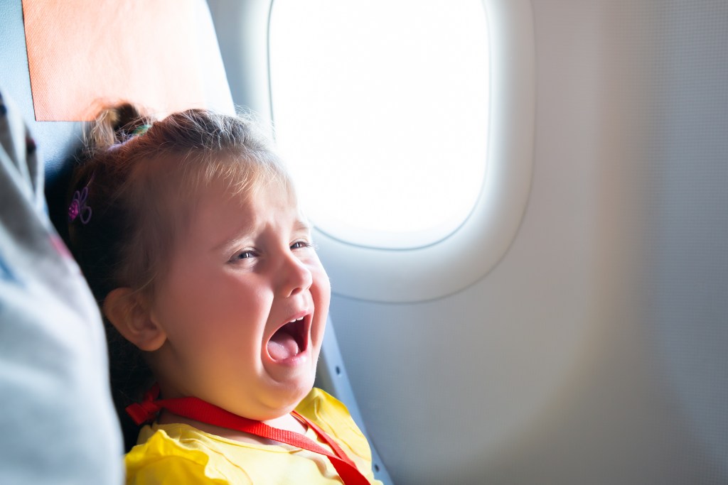 Crying child on plane.