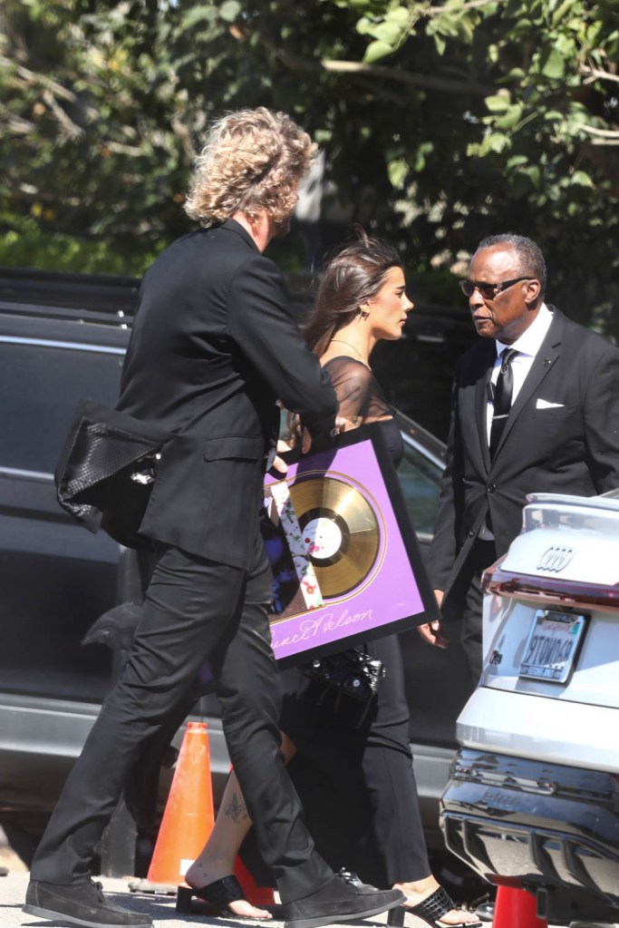 Yung Gravy and Ari Kytsya attends as Jordyn Woods and Karl-Anthony Towns tie the knot during an intimate, star-studded wedding ceremony in Malibu, California. 