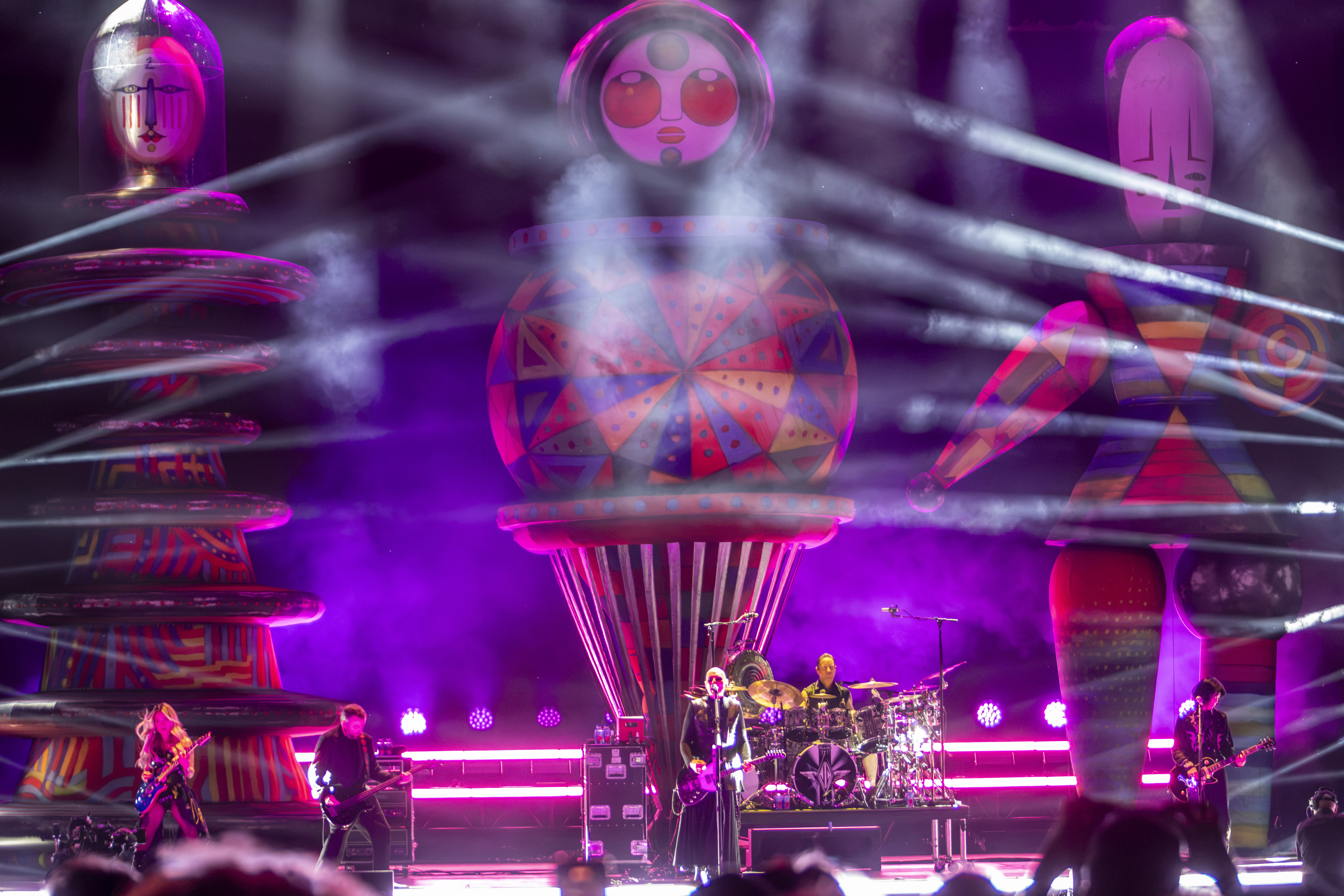 Kiki Wong, Jack Bates, Bill Corgan, Jimmy Chamberlin, and James Iha of the Smashing Pumpkins perform during Lollapalooza
