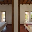 © Syam Sreesylam The Threshold House / Madras Spaces - Interior Photography, Bedroom, Wood, Bed, Lighting, Chair, Beam