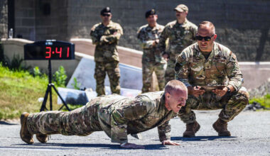 Staff Sgt. Philip Slick performs pushups under pressure during the 101st Air Refueling Wing Security Forces Squadron Best Defender Competition in Bangor, Maine, July 27, 2026. The competition tested security forces Airmen's proficiency in land navigation, marksmanship, tactical fitness, doctrine knowledge and endurance