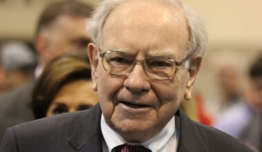 Warren Buffett in front of a small crowd.