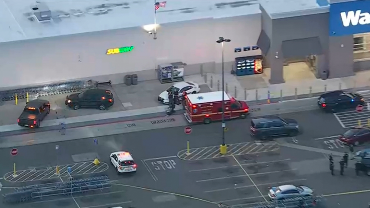 officers outside Walmart in Darby Township, Pa.