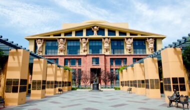 Walt Disney Company building with the Seven Dwarves holding up the roof.