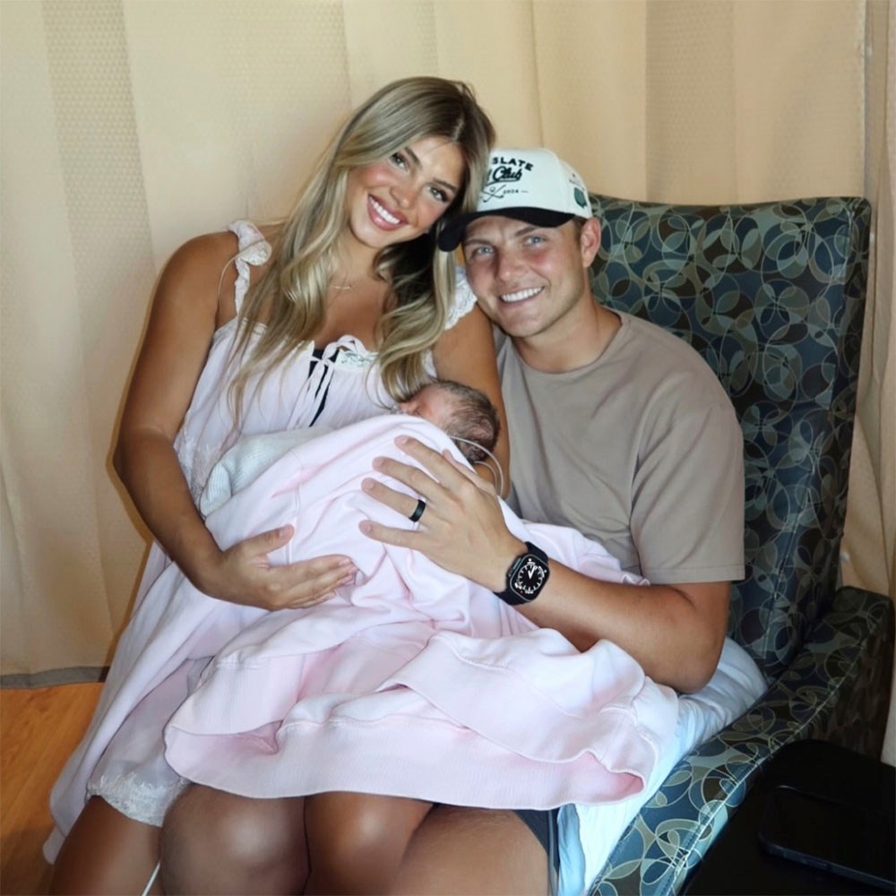 Nicolette Wilson and Zach Wilson with their daughter, Francesca Belle.
