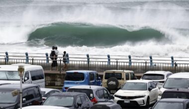 Tropical storm hits Tokyo area, leaving thousands without power before moving west