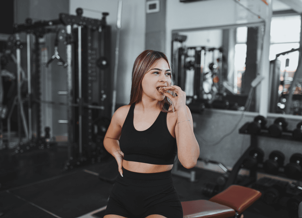 Woman eating protein
