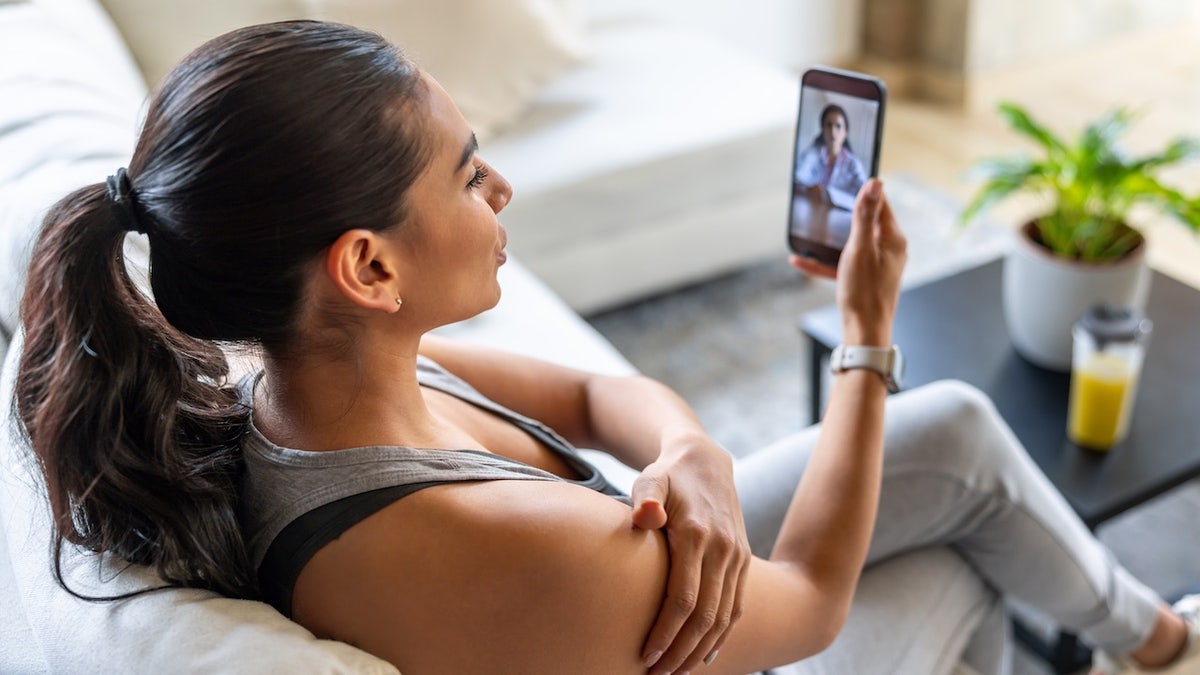 Woman getting telehealth