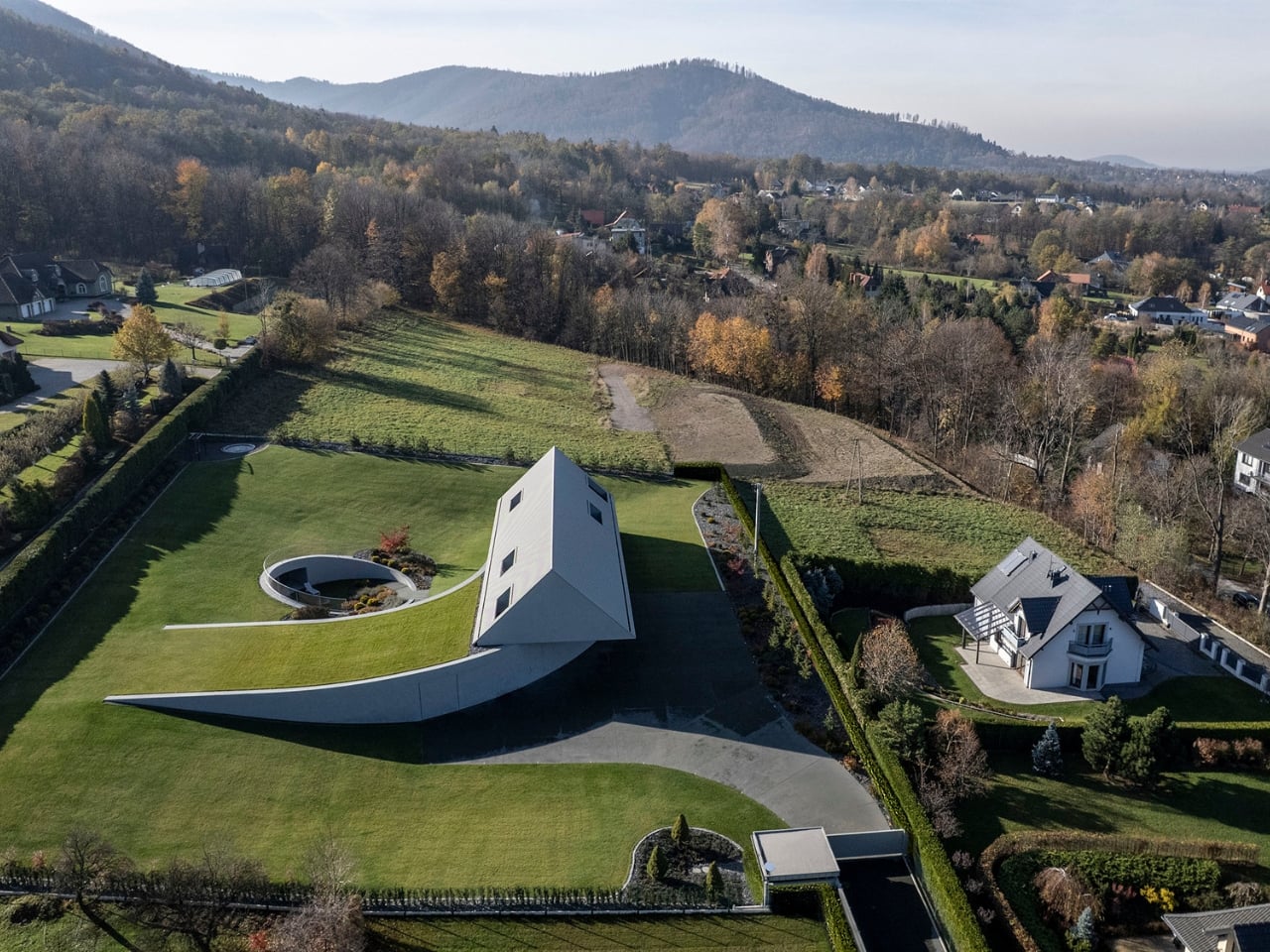A Polish Architect Rotated His House to Hide It in the Hill