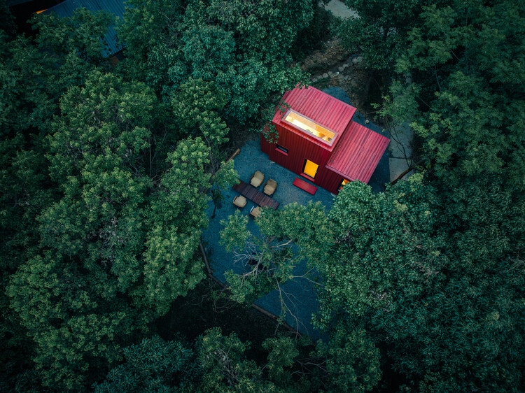 Red Submarine Cabin / Wiki World - Exterior Photography, Forest