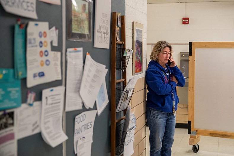 Barb McEver, co-founder of Project 1020, takes a phone call on Wednesday, Jan. 8, at the Lenexa shelter.