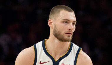 Apr 30, 2026; Minneapolis, Minnesota, USA; Denver Nuggets guard Christian Braun (0) dribbles the ball against the Minnesota Timberwolves in the second half during game six of the first round of the 2026 NBA Playoffs at Target Center. Mandatory Credit: Jesse Johnson-Imagn Images