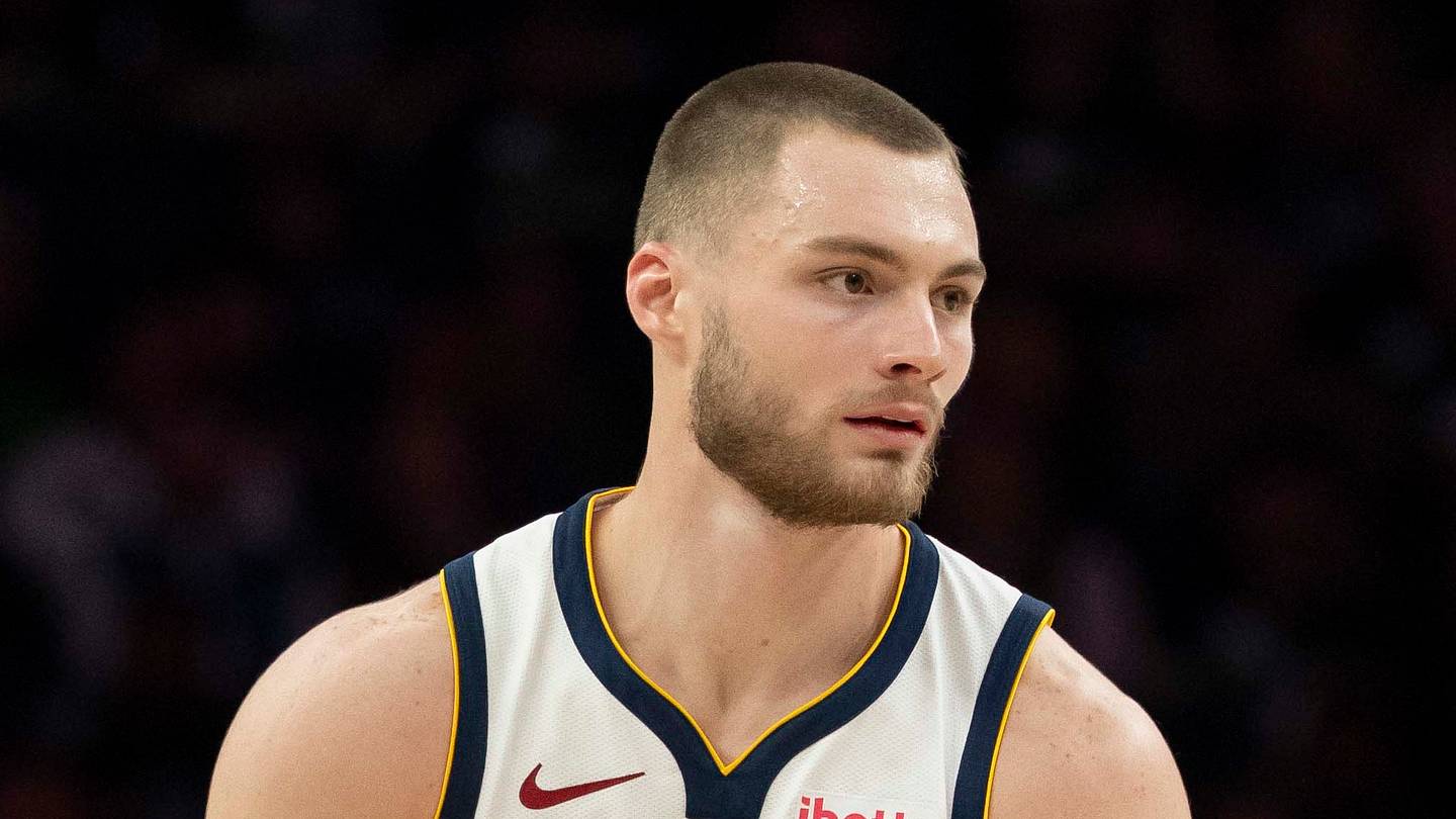 Apr 30, 2026; Minneapolis, Minnesota, USA; Denver Nuggets guard Christian Braun (0) dribbles the ball against the Minnesota Timberwolves in the second half during game six of the first round of the 2026 NBA Playoffs at Target Center. Mandatory Credit: Jesse Johnson-Imagn Images