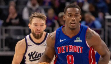 Jan 25, 2026; Detroit, Michigan, USA; Detroit Pistons center Jalen Duren (0) moves the ball up court in front of Sacramento Kings forward Domantas Sabonis (11) during the during the second half at Little Caesars Arena. Mandatory Credit: David Reginek-Imagn Images