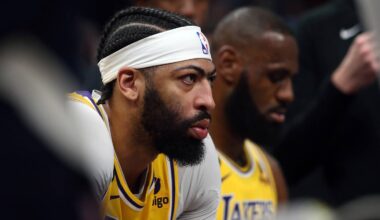Apr 19, 2023; Memphis, Tennessee, USA; Los Angeles Lakers forward Anthony Davis (3) and forward LeBron James (6) sit on the bench during a timeout during game two of the 2023 NBA playoffs against the Memphis Grizzlies at FedExForum.