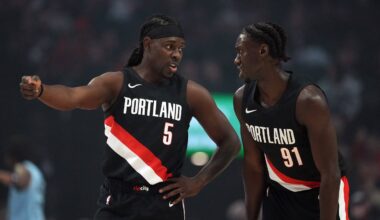 Feb 7, 2026; Portland, Oregon, USA; Portland Trail Blazers guard Jrue Holiday (5) talks with Sidy Cissoko (91) during the first half against the Memphis Grizzlies at Moda Center. Mandatory Credit: Soobum Im-Imagn Images