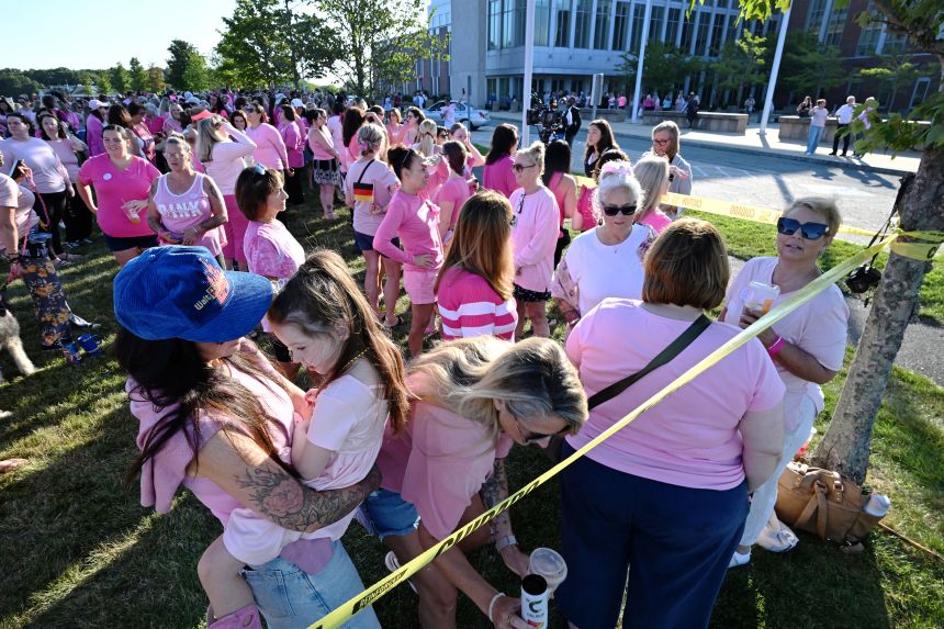 Supporters of Lindsay Clancy clad in pink gathered outside the courthouse in Plymouth, Massachusetts, during Clancy's triple-murder trial.