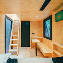 © Xhot Red Submarine Cabin / Wiki World - Interior Photography, Bedroom, Wood