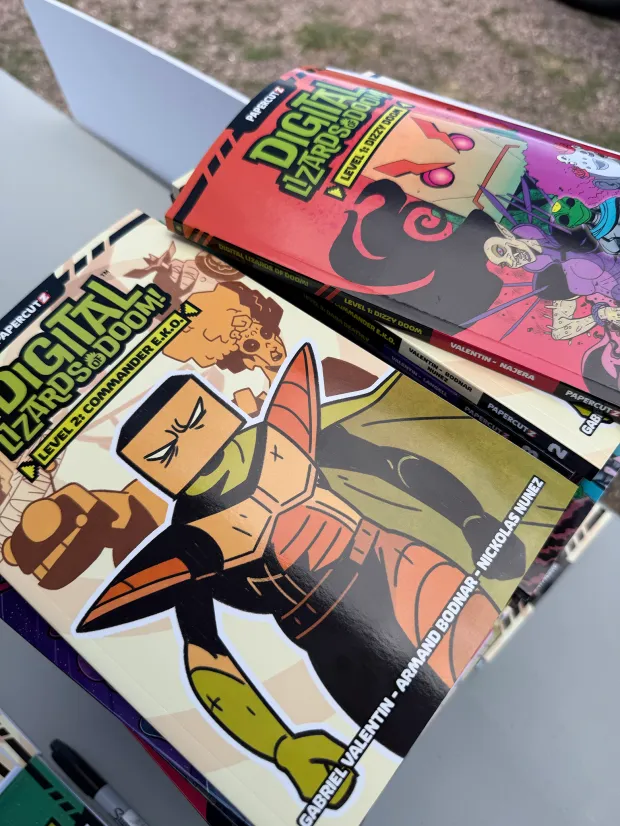 Tens of thousands of books in the Digital Lizards of Doom series have been donated to military families in the Colorado Springs region. Couresty Dizzy Doom Kids 