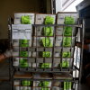A U.S. Postal Service worker loads mail-in ballots onto a truck in 2022 in Miami.