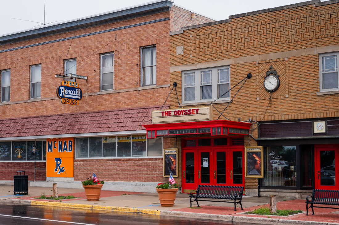Downtown Newberry, Mich. The single-screen Tahqua Land Theater plays new movies, while the neighboring drug store has closed.
