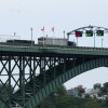 Tractor trailers cross the Peace Bridge at the Canada-United States border in Fort Erie, Ontario, Canada, on August 20.