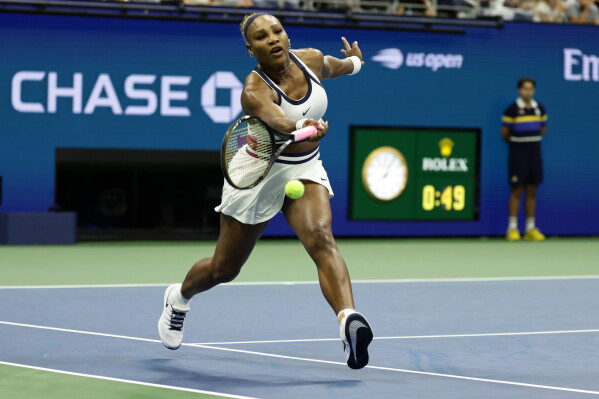 Serena Williams, of the United States, hits a return as she plays a women's doubles match with partner Venus Williams against Hao-Ching Chan, of Taiwan, and Maya Joint, at the U.S. Open tennis championships, Friday, Sept. 4, 2026, in New York. (AP Photo/Adam Hunger)