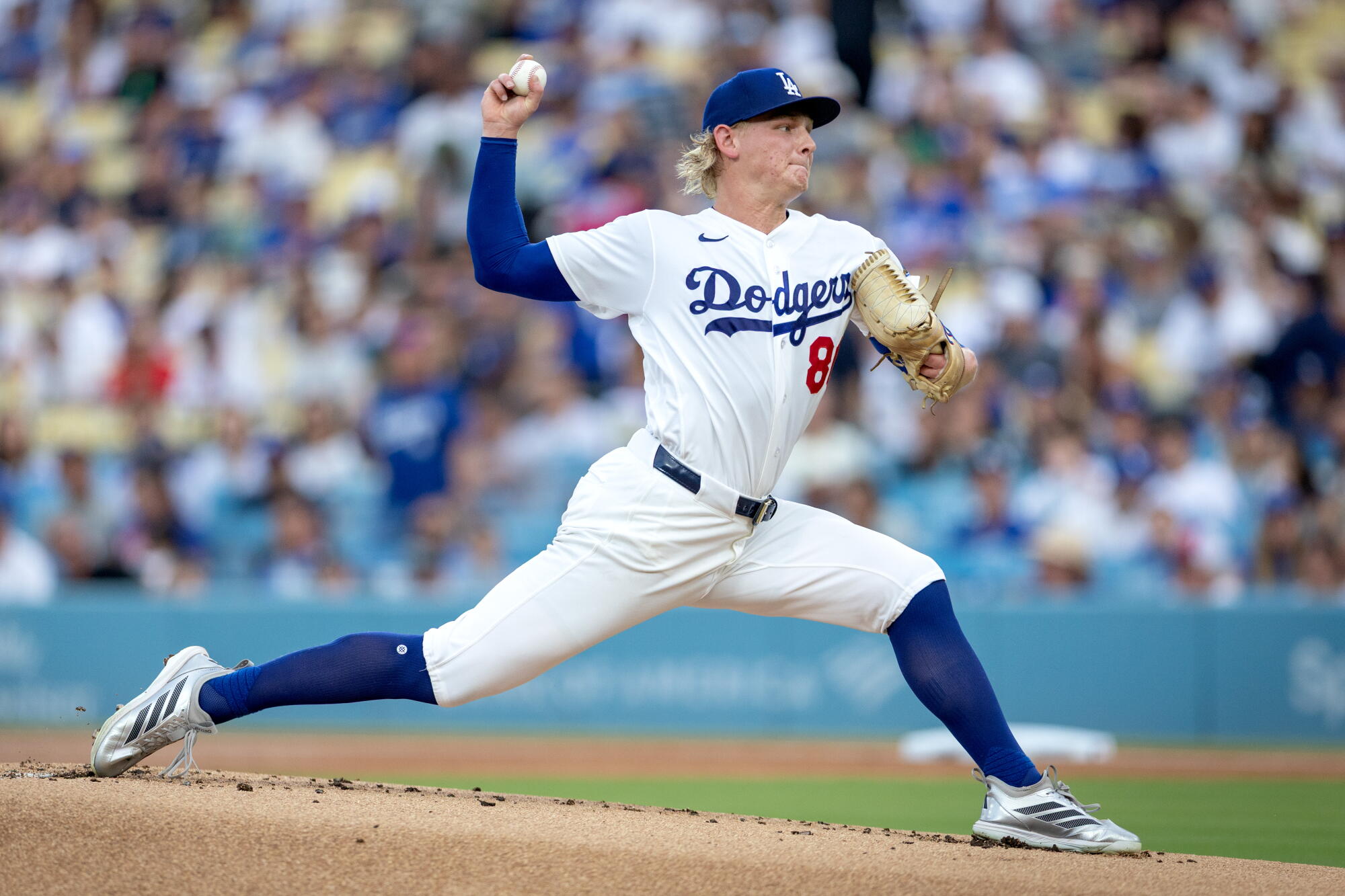 Dodgers pitcher Emmet Sheehan delivers during the third inning against the Reds on Monday.