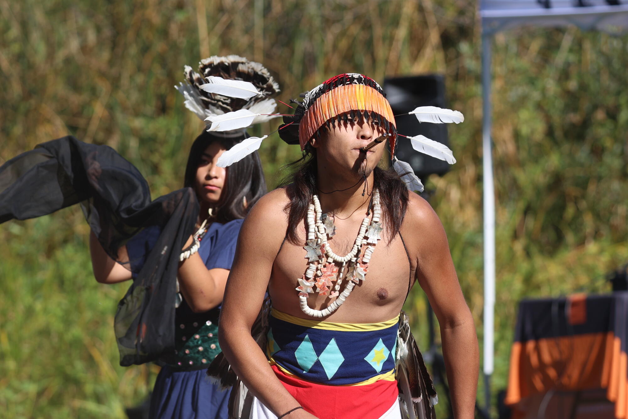 Native Americans perform during an event at Clear Lake.