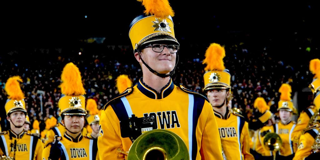 Iowa band member dies after collapsing in extreme heat at football game