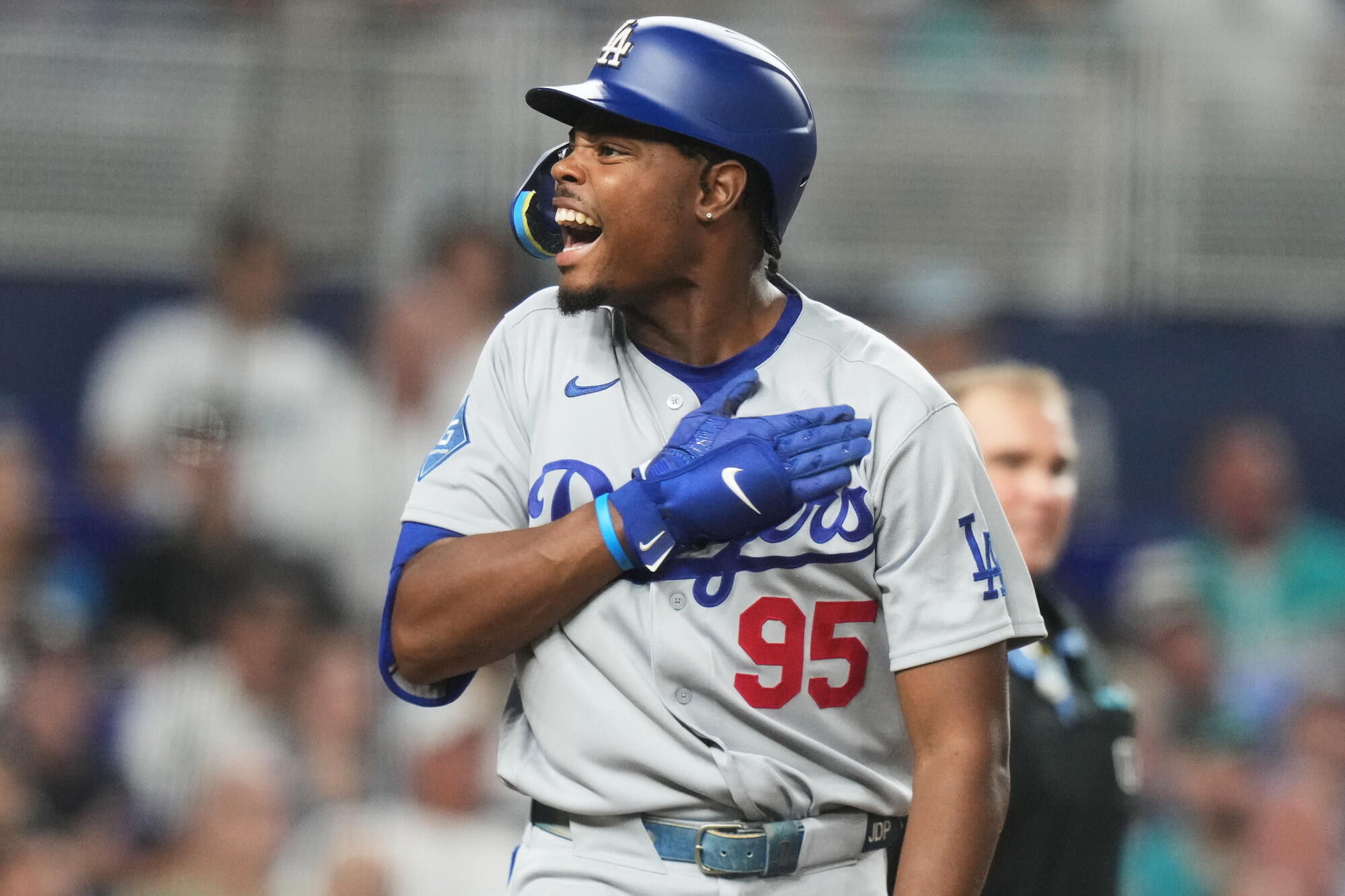 Dodgers rookie Josue De Paula celebrates after hitting a three-run homer against the Marlins Sunday in Miami.