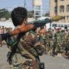 A fighter with Yemen’s Houthi rebels carries a rocket-propelled grenade launcher as they march during a mobilization campaign in Sanaa, Yemen, Thursday.