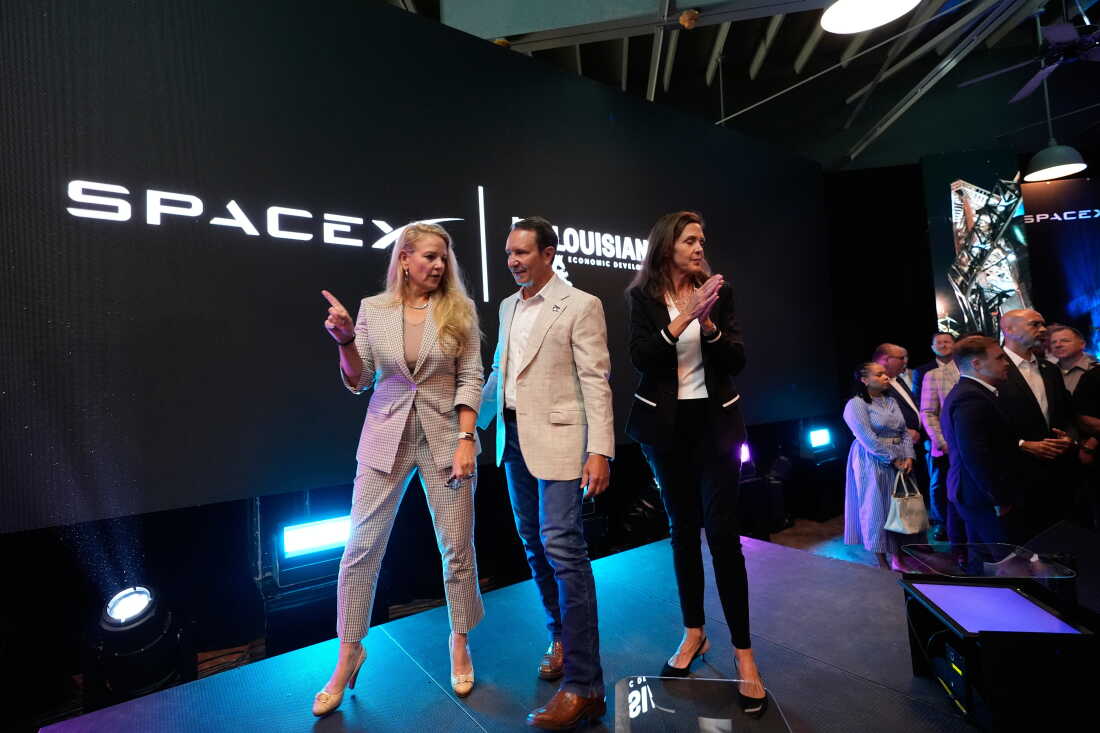 SpaceX President and COO Gwynne Shotwell (left) speaks with Louisiana Gov. Jeff Landry and Secretary of Louisiana Economic Development Susan Bonnett Bourgeois during an event with SpaceX announcing a deal to build a new spaceport in Louisiana Aug. 25 in Abbeville, La.