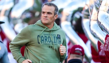 Which college football coaches improved or tanked their hot seat status four games into the season?
