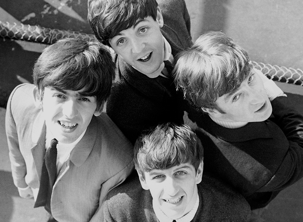 An early to mid-1960s photo of the Beatles