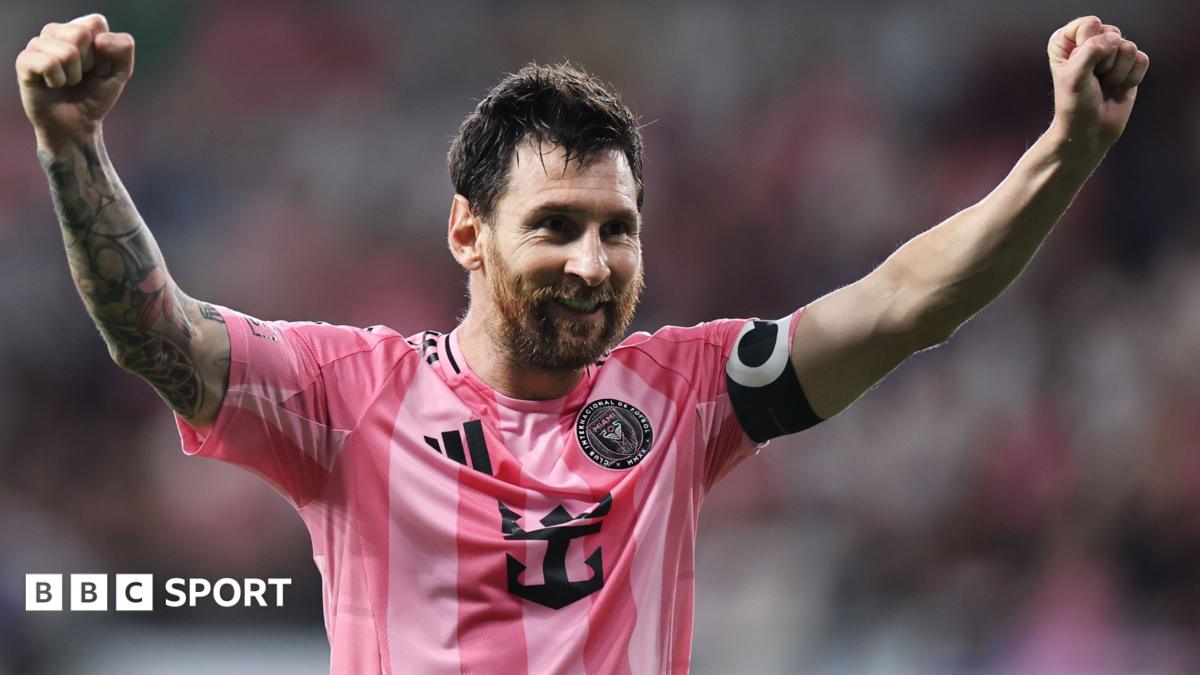 Lionel Messi holding his arms aloft in celebration while playing for Inter Miami