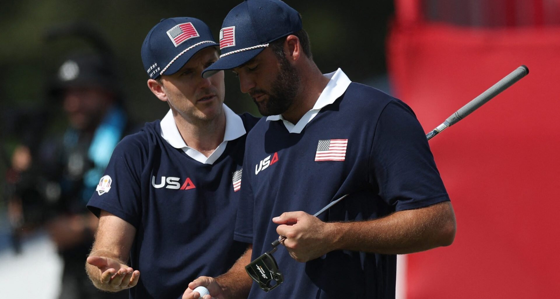 Golf - The 2025 Ryder Cup - Bethpage Black Golf Course, Farmingdale, New York, United States - September 27, 2025 Team USA's Russell Henley and Team USA's Scottie Scheffler react on the 18th green during the foursomes REUTERS/Paul Childs