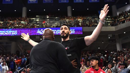 Aug 23, 2026; Chicago, Illinois, USA; Turkish-American former basketball player and human rights activist Enes Kanter Freedom reacts as he is removed from the arena during the second half against the Indiana Fever at Wintrust Arena. Aug 23, 2026; Chicago, Illinois, USA; Turkish-American former basketball player and human rights activist Enes Kanter Freedom reacts as he is removed from the arena during the second half against the Indiana Fever at Wintrust Arena.