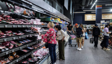 People shop for groceries in New York City