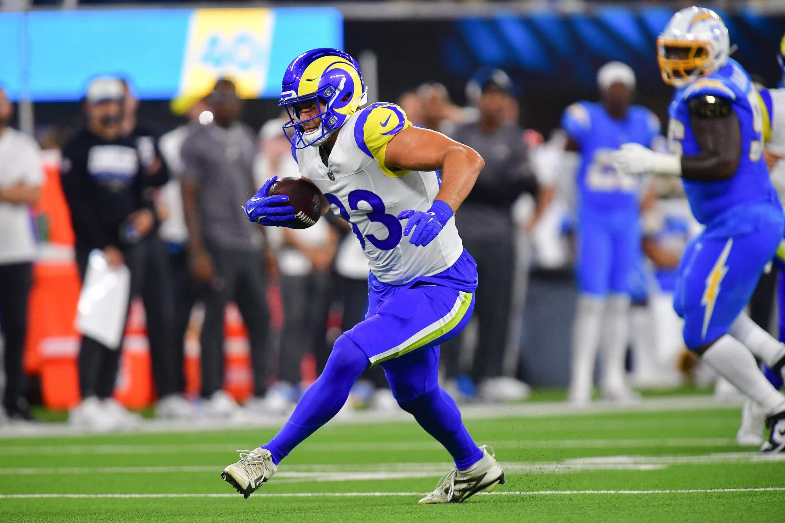 Los Angeles Rams tight end Mark Redman (83) runs the ball against the Los Angeles Chargers during the first half at SoFi Stadium.
