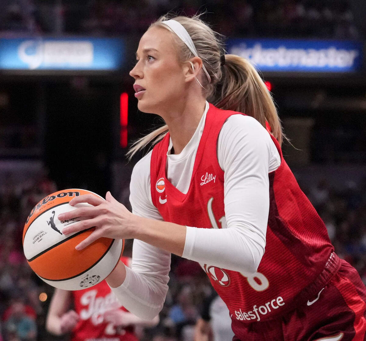 Indiana Fever guard Sophie Cunningham (8) looks to shoot the ball against the Connecticut Sun during a game on Friday, Aug. 28, 2026, at Gainbridge Fieldhouse in Indianapolis. The Fever defeated the Sun 111-91.