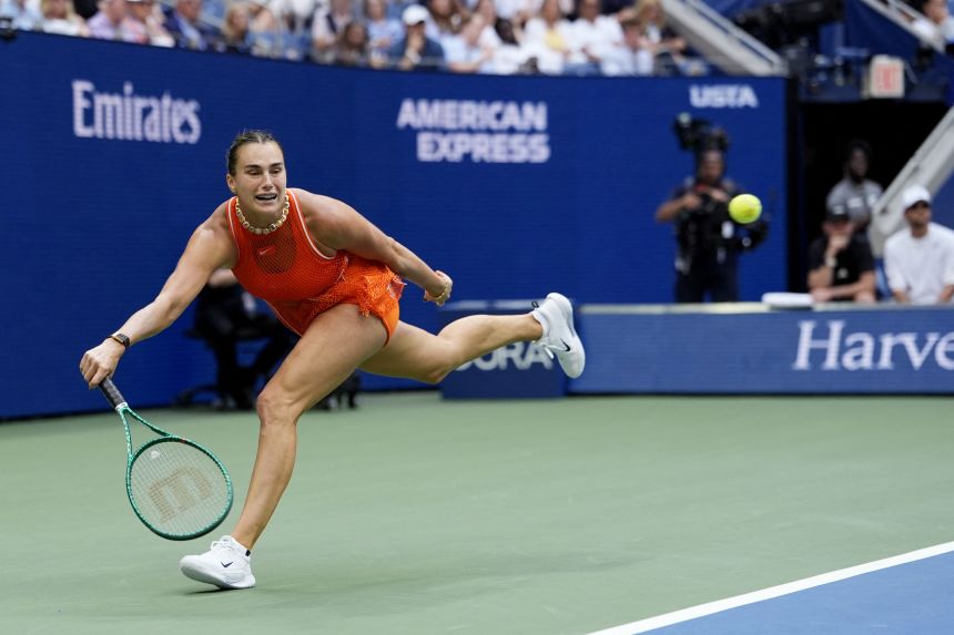Aryna Sabalenka moves to return the ball during her women's singles final match against Elena.