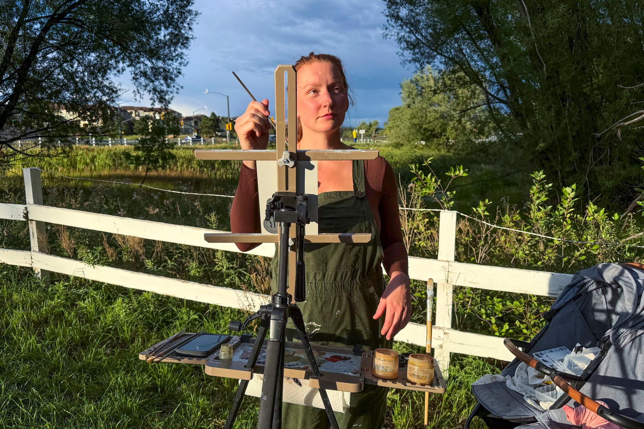 Katie Sermons works on a plein air painting in Colorado Springs. Aug. 28, 2026.