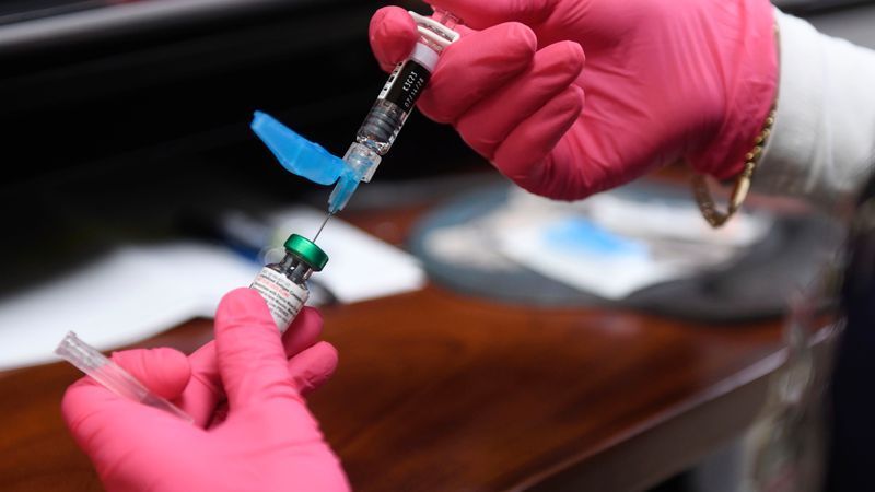 FILE - Anna Hicks prepares a measles, mumps and rubella vaccine at the Andrews County Health Department, Tuesday, April 8, 2025, in Andrews, Texas. (AP Photo/Annie Rice, File)