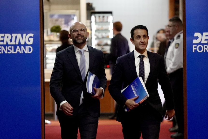 David Janetzki and David Crisafulli at Queensland Parliament with the 2026-27 Queensland budget.