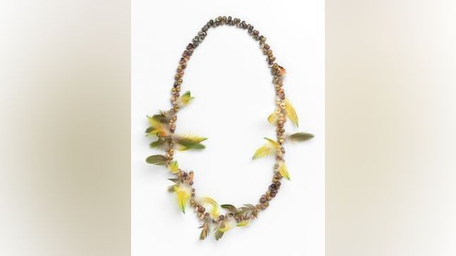 {p}Rose Mamuniny Gurruwiwi. Gälpu born 1944. Mani Mani (Necklace) 1993, welirr (shells), butju (feathers), nylon thread. 30.5 × 21.0 × 5.0 cm (variable). National Gallery of Victoria, Melbourne . Purchased through The Art Foundation of Victoria with the assistance of the Alcoa Foundation, Governor, 1994 (O.168-1994). © Mamuniny 2/ Copyright Agency, 2024. Photo: Heath Warwick / NGV{/p}