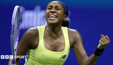 Coco Gauff clenches her fist and yells in celebration after beating Paula Badosa at the US Open