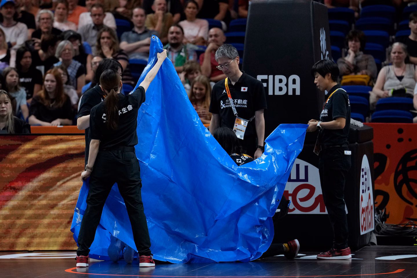 Japan's Saki Hayashi goes off with suspected broken arm at women’s FIBA World Cup