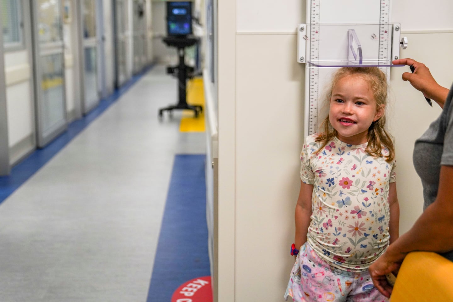 A nurse measured Olivia’s height.